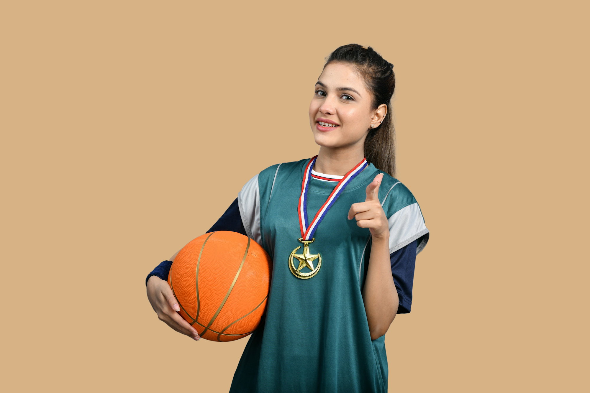 a-man-holding-a-basketball.jpg a man holding a basketball
